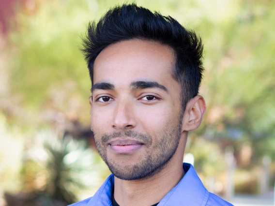 portrait photo of young man with short hair