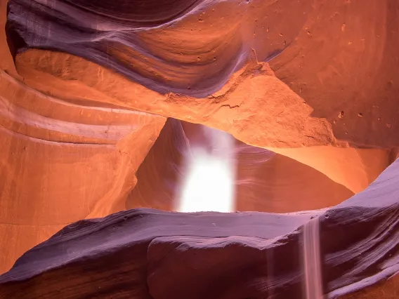 a waterfall inside a cave