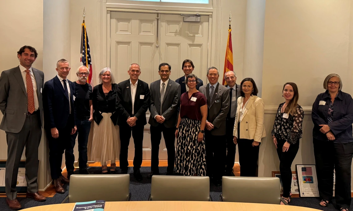 A delegation from CNRS poses for a picture with U of A leadership.