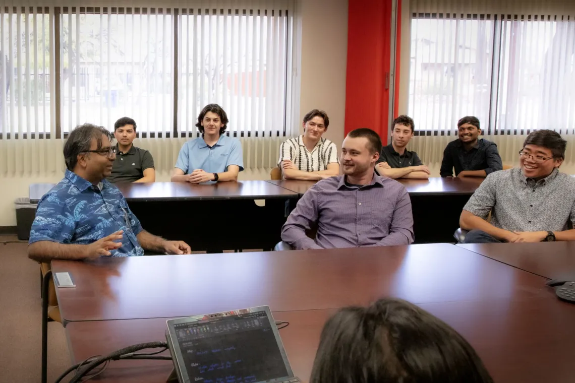 Jekan Thanga, associate professor of AME, speaks to a class of students.