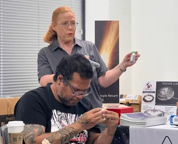 Image of meteorite research specialist teaching educators at the workshop