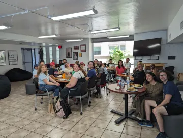 Image of Grad CAFE students sharing a meal together