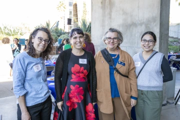 Image of WOI honorees, Keri Miller, Christina Kalel, Lisa Elfring and Amanda Bernal posing together.